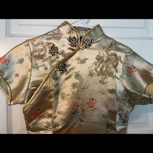 Gold Asian style dress.